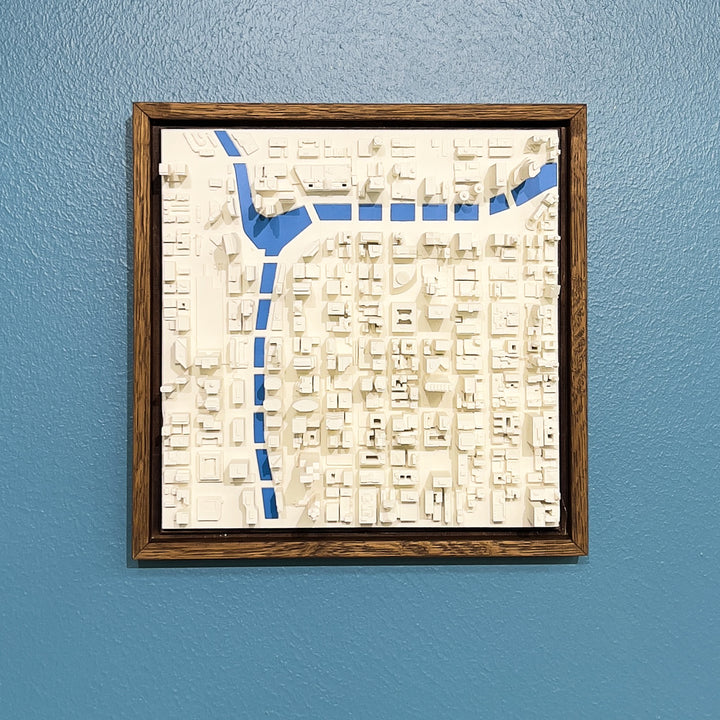 3D map of Chicago with a dark frame and blue water