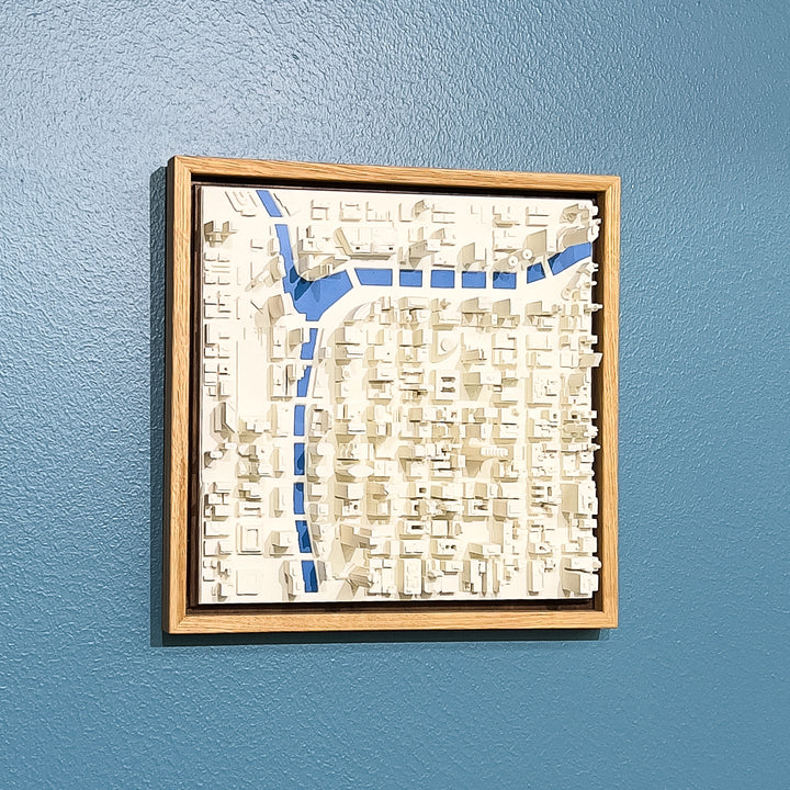 3D map of Chicago with a light frame and blue water