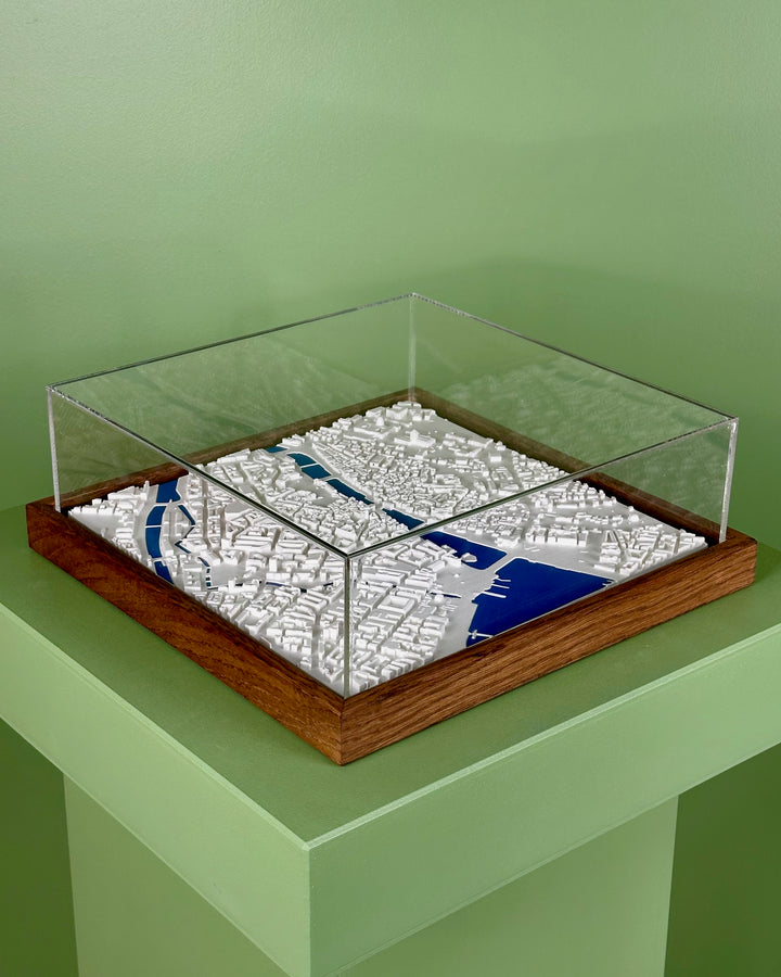 3D map of Zurich with dark frame, acrylic case and blue water.