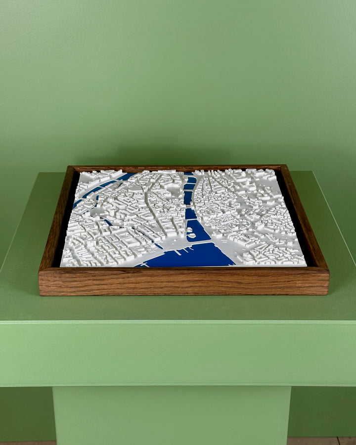3D map of Zurich with dark frame and blue water.